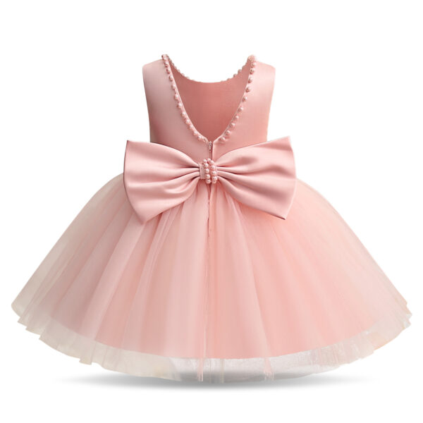 Vestido de fiesta con lazo y perlas